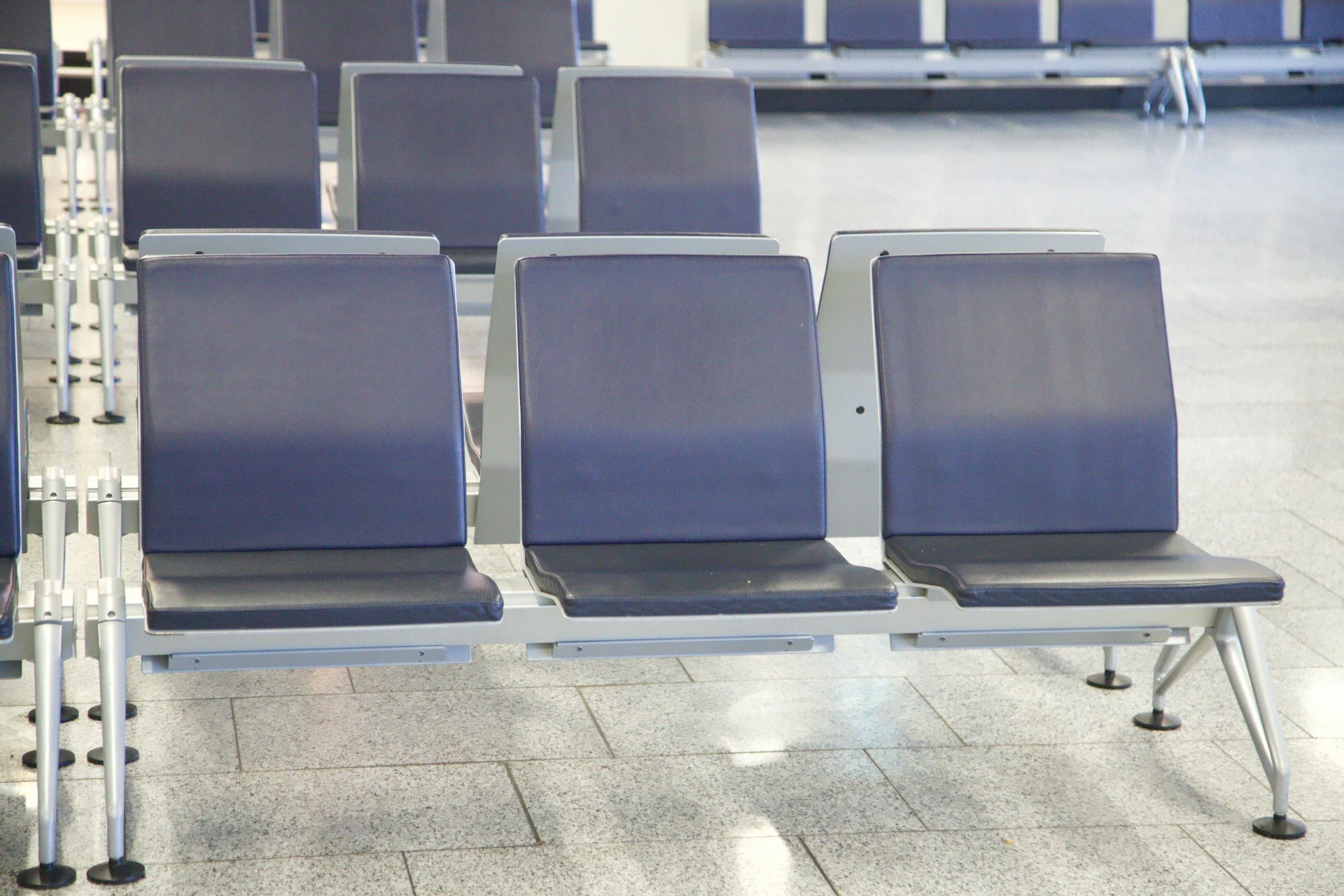  spacious hospital waiting area featuring comfortable seating