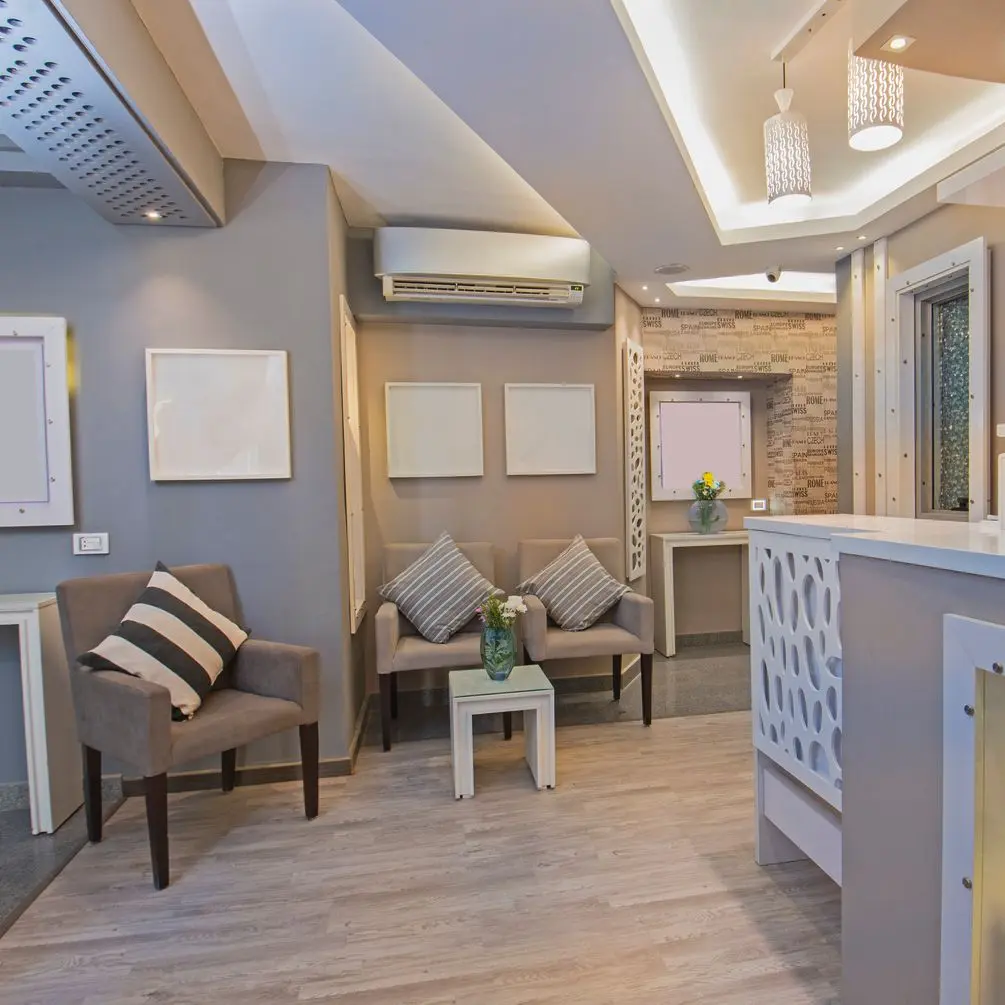 Reception area with desk and chairs