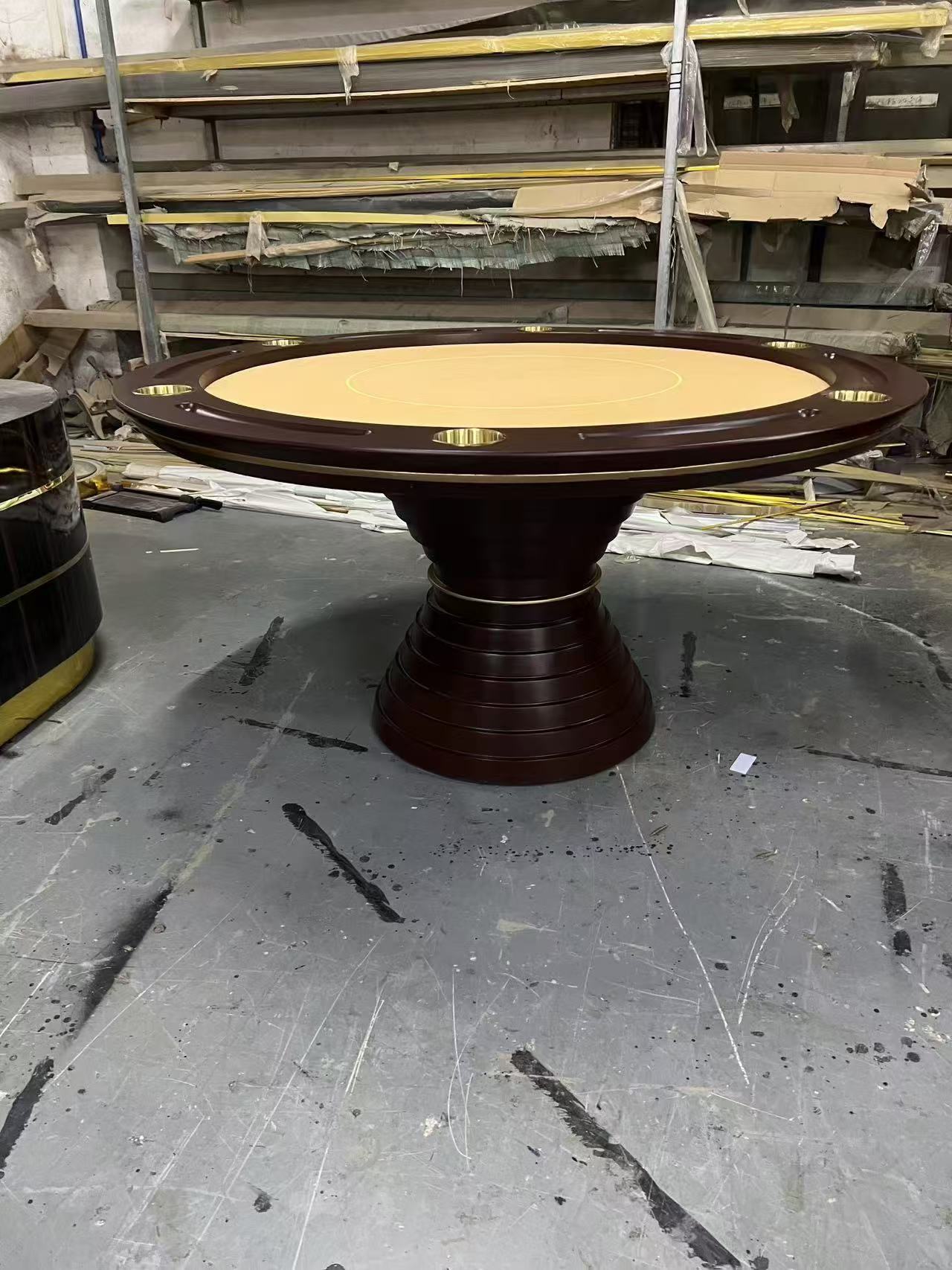 A round poker table with a wooden finish