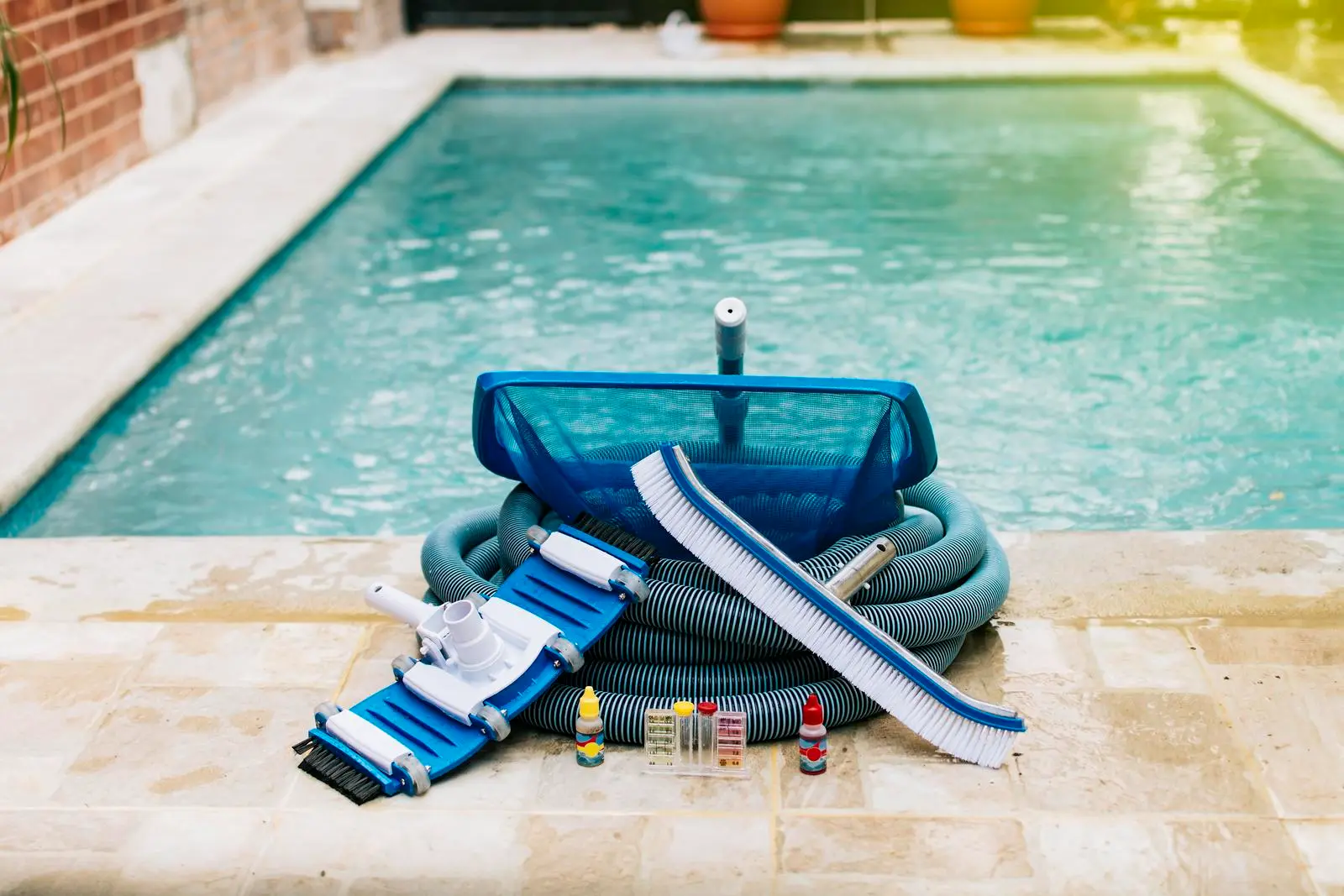 Collection of pool cleaning supplies