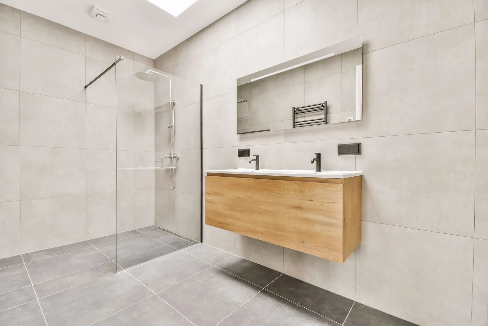 Modern bathroom featuring floor tiles