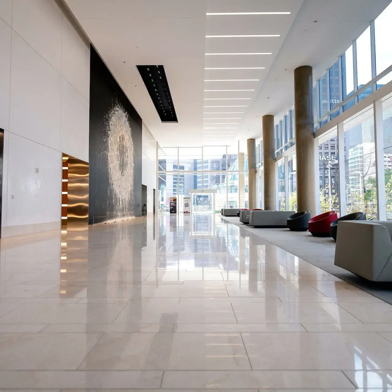 Discovering Diverse and Cost-Efficient Floor Finishes Sourced from China Spacious modern lobby with polished marble flooring