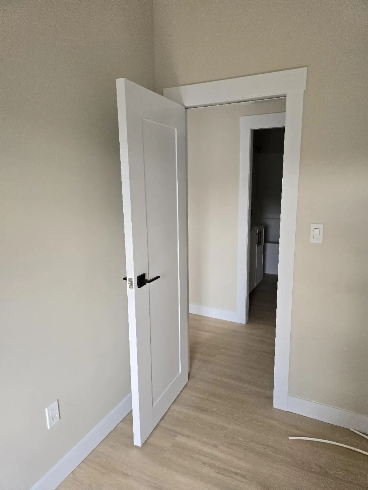  Interior view of an open door leading to a room
