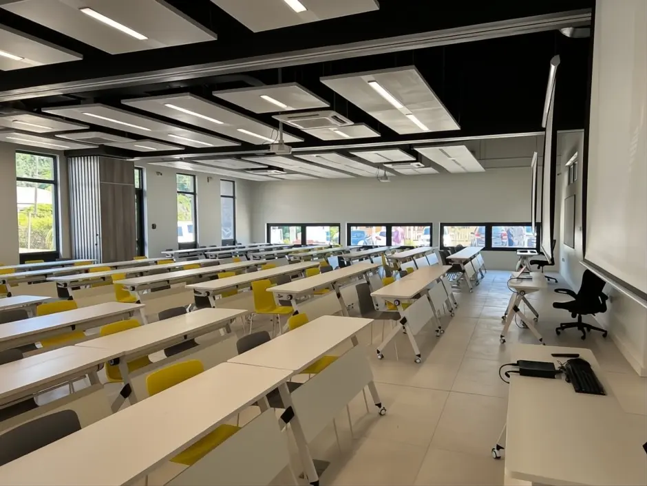 Modern classroom at SJSM Pre-Med featuring flexible seating arrangements, ample natural light, and contemporary design for effective learning.