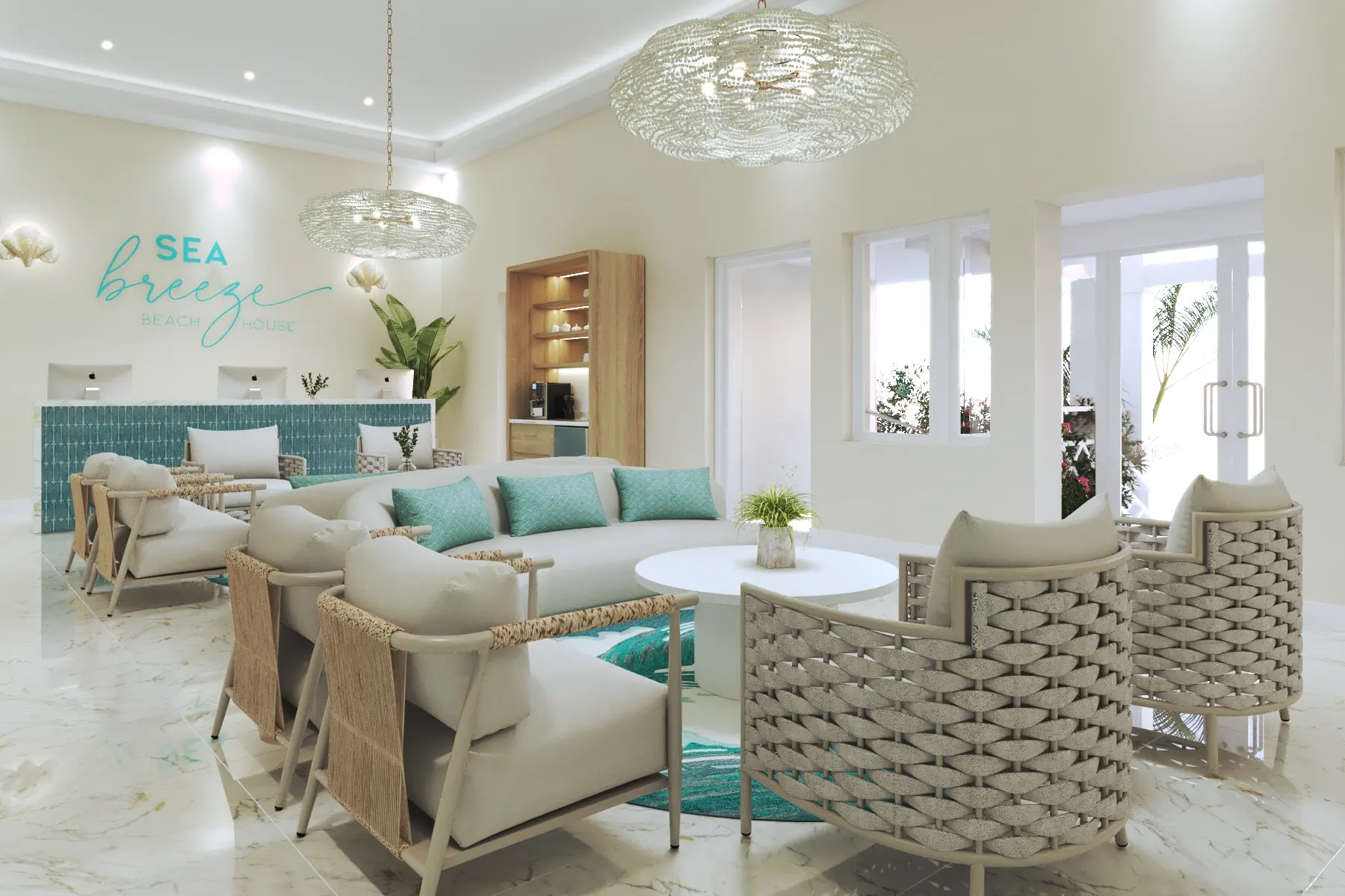right and inviting lobby of Sea Breeze Beach House featuring modern furnishings, turquoise accents, and large windows.