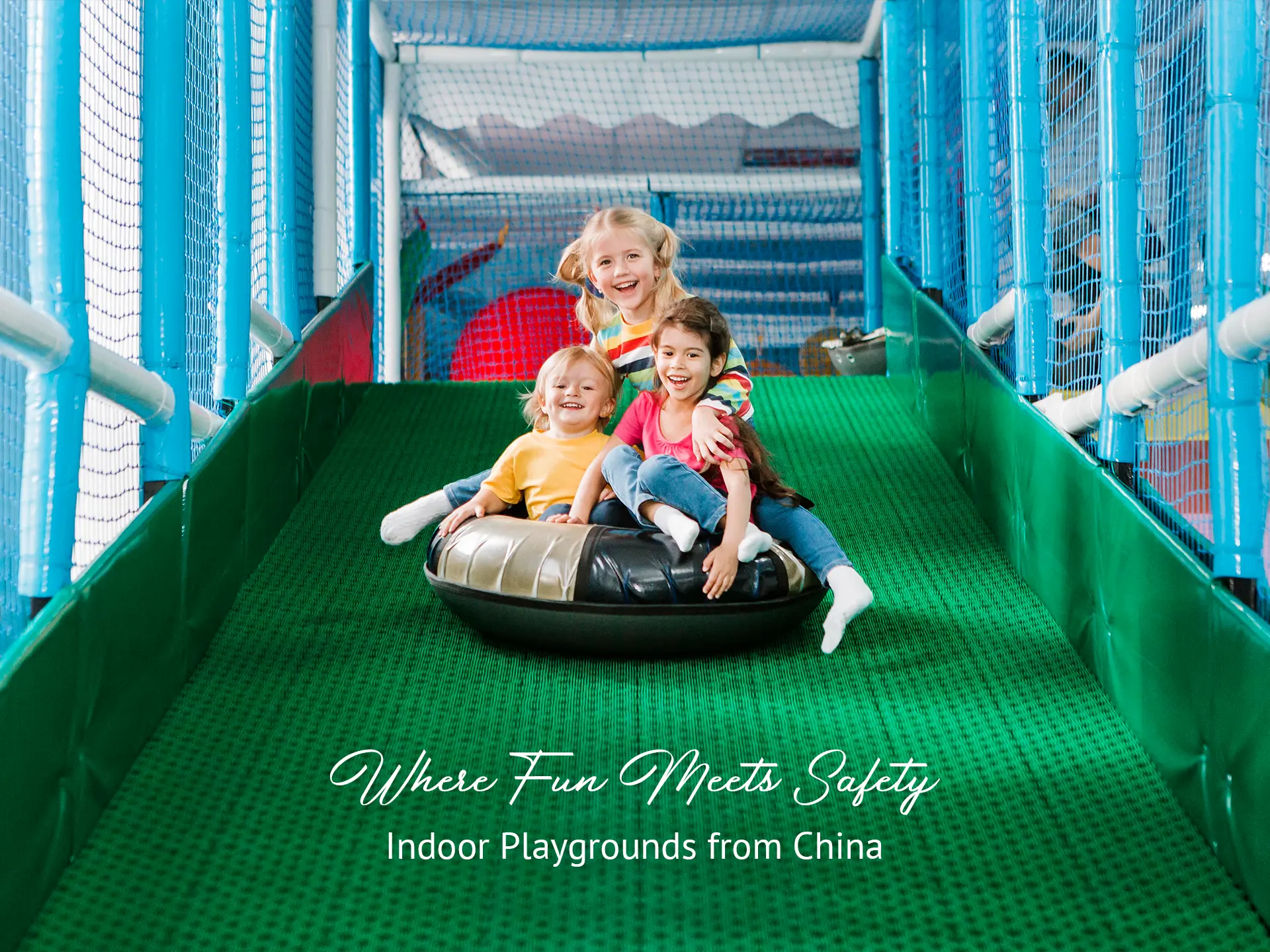 An indoor sliding playgound The kids were sliding on an indoor playground.