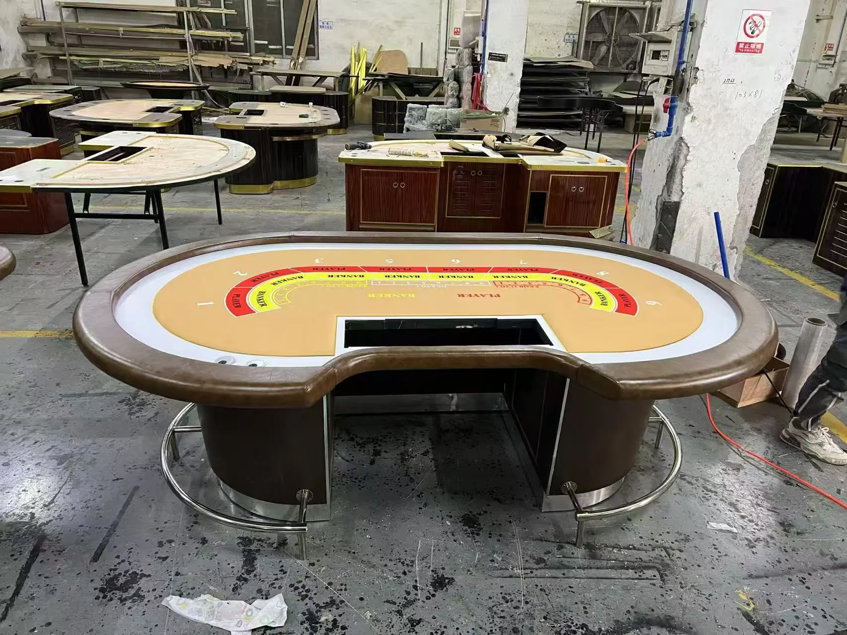 Custom Oval Gaming Table with Illumination - GZS Sourced Oval gaming table with illuminated rail and chip trays, showcasing the specialized FF&E custom manufacturing managed by Guangzhou Sourcing (GZS).