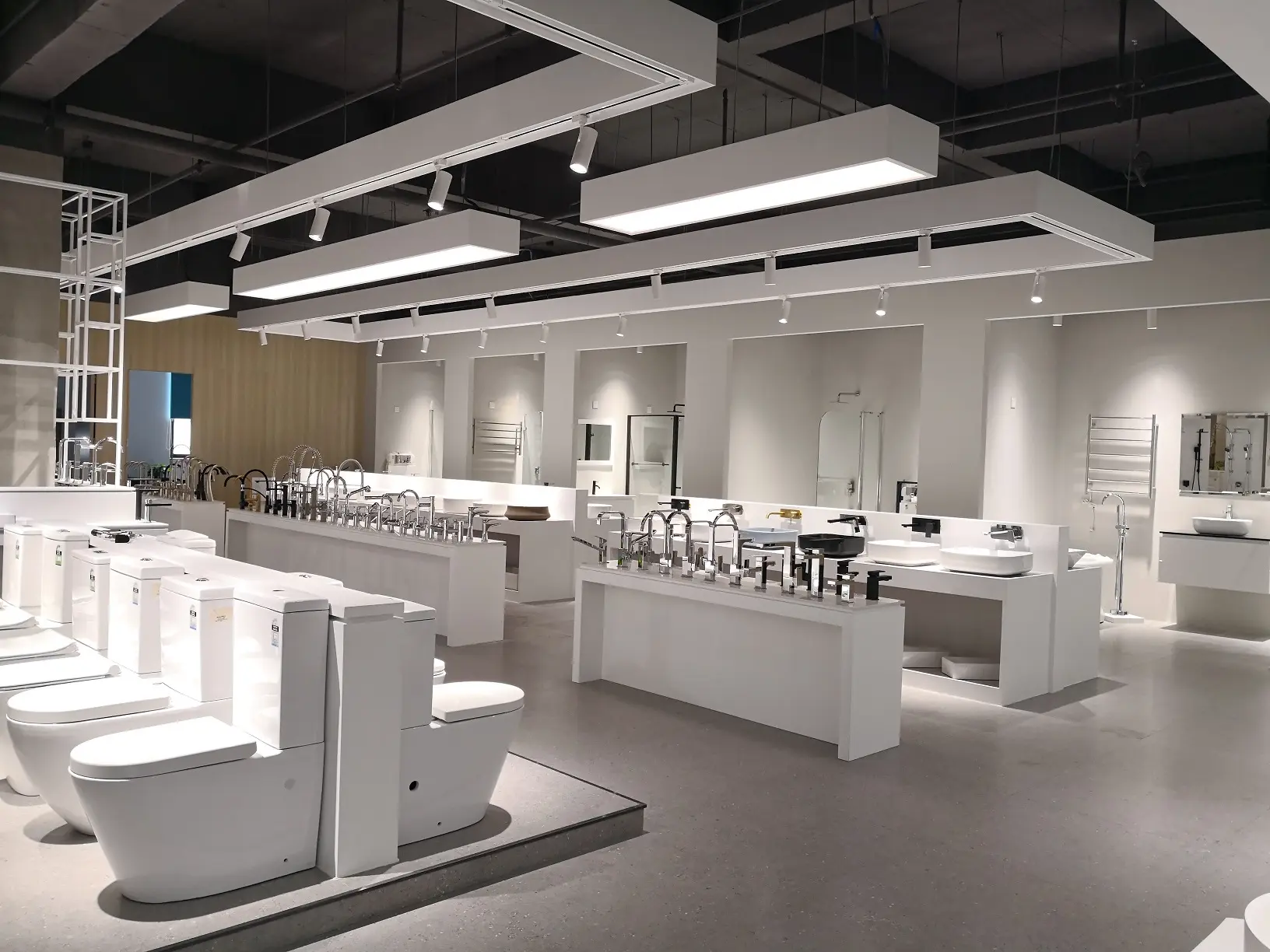 Wide showroom of hotel sanitary ware featuring toilets, basins, and faucets in China
