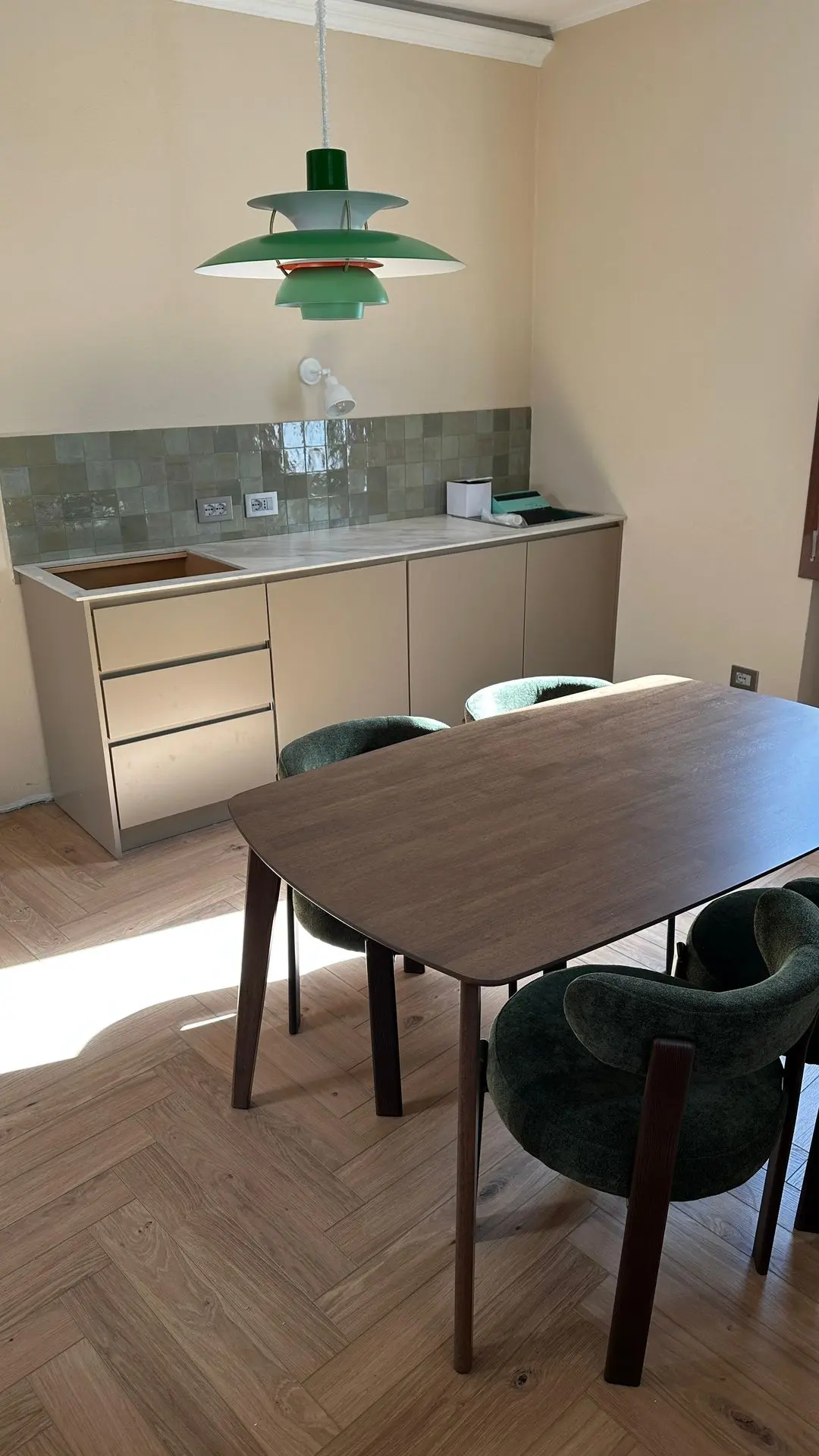 Modern kitchen and dining setup with curated furniture sourced by Guangzhou Sourcing for the Lake Como Boutique Hotel.