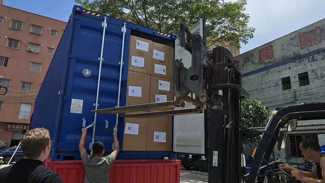 Container loading during product export - Guangzhou Sourcing overseeing shipment process in China.
