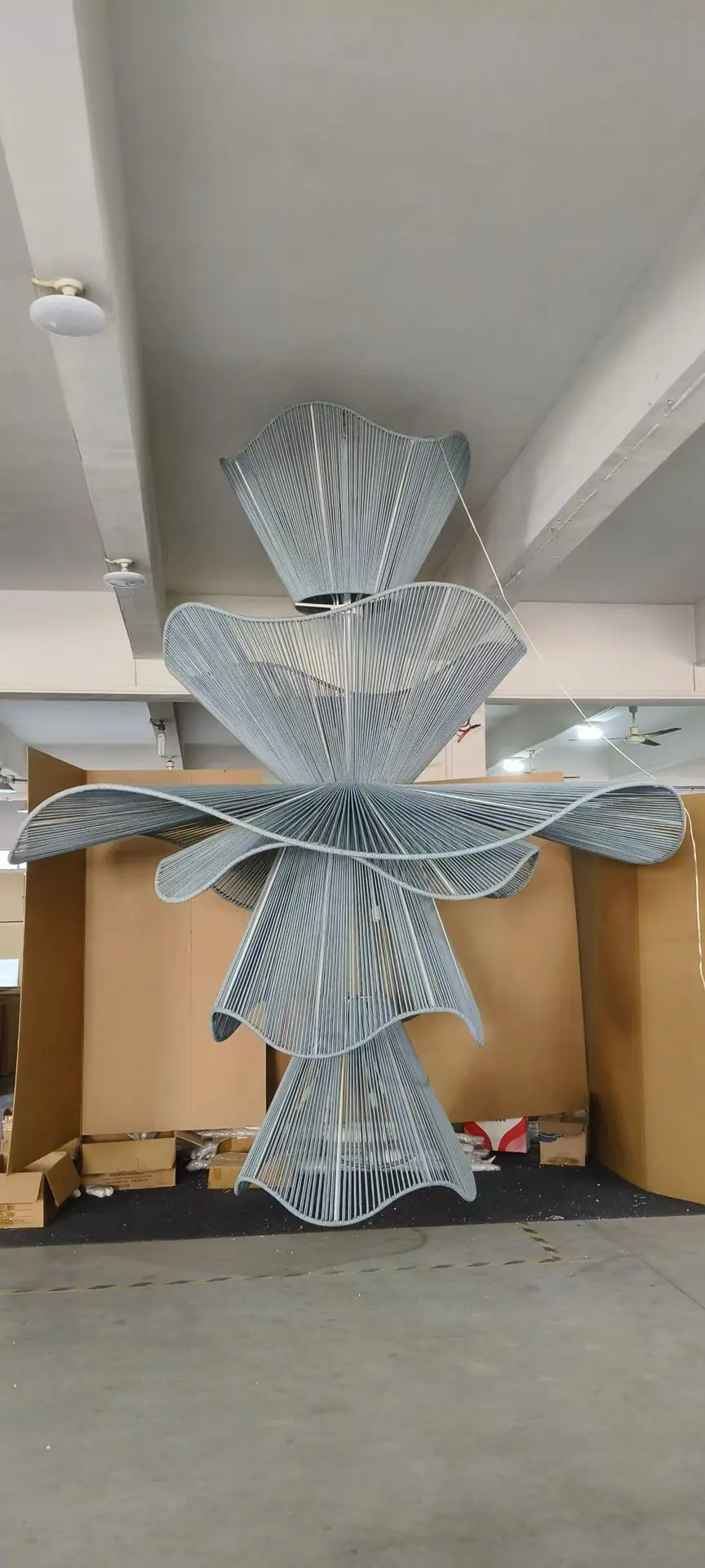 Large-scale custom hotel chandelier under production for the Sapphire Sands project in China