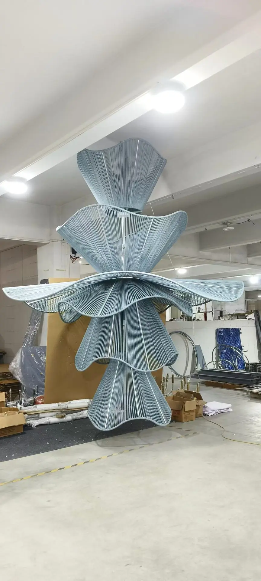 Custom hotel chandelier inspection and assembly for the Sapphire Sands project in China