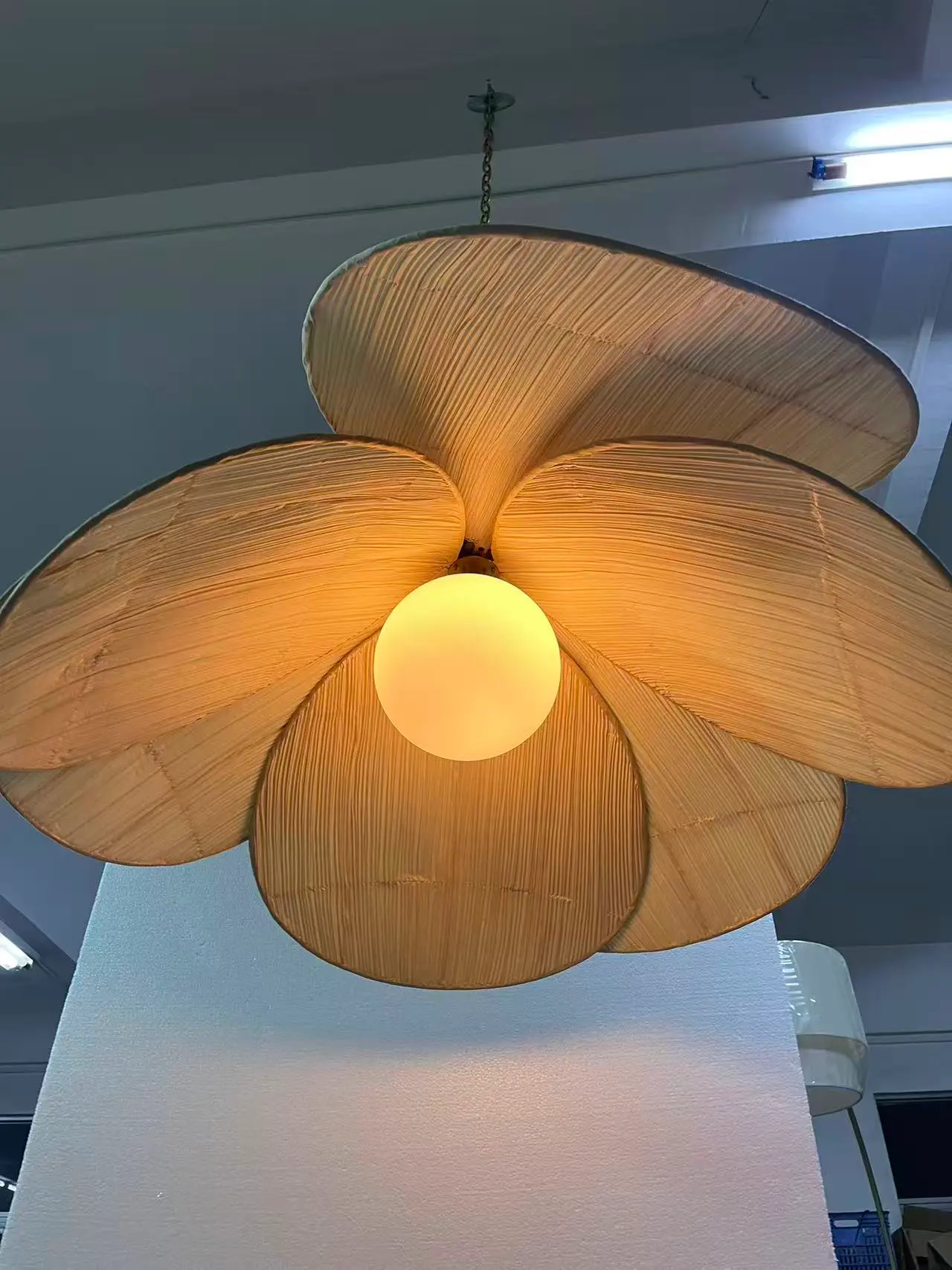 Sapphire Sands Villas decorative pendant light with woven petal-style shade, sourced by Guangzhou Sourcing
