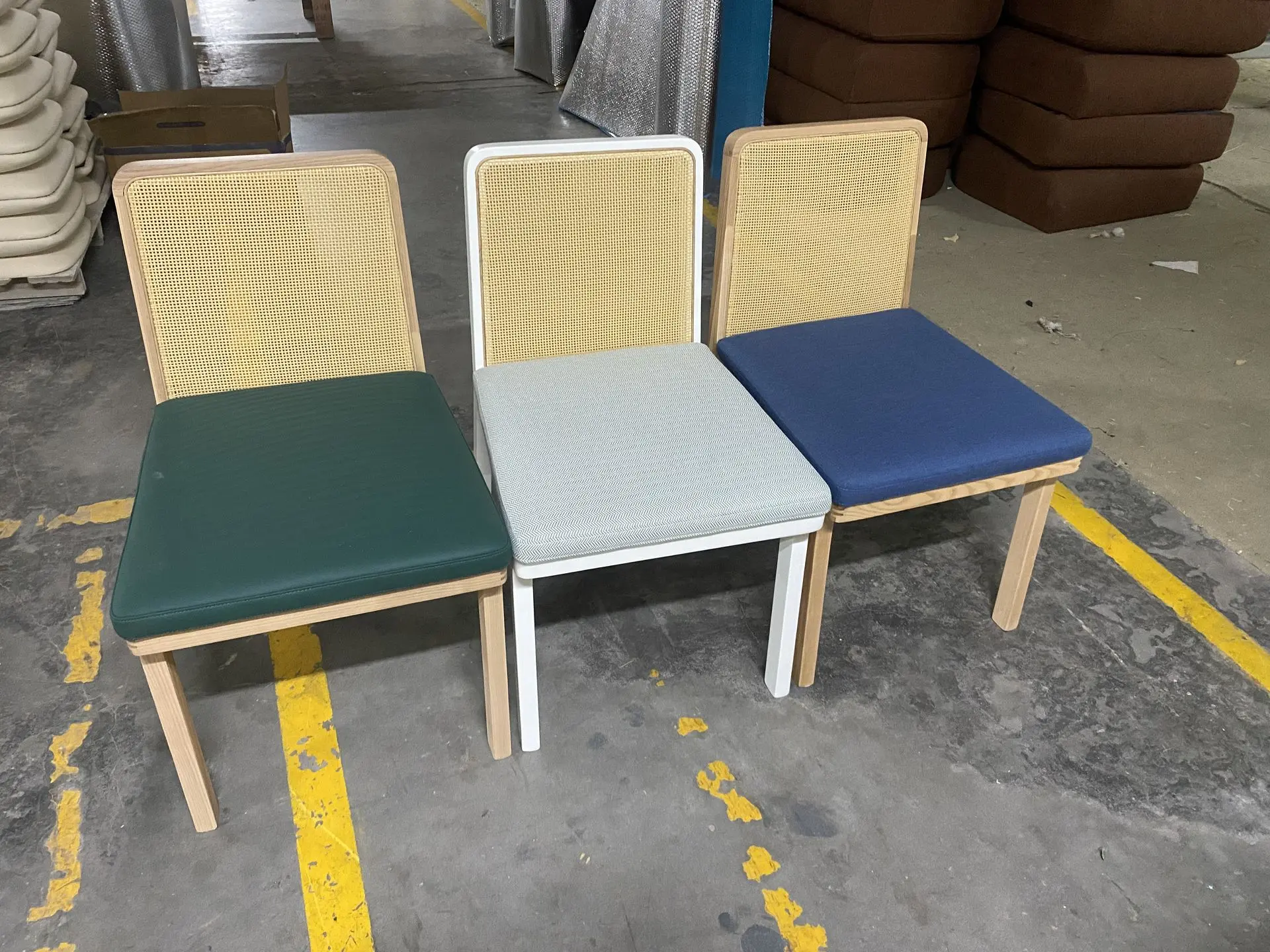 Sapphire Sands Villas guest seating chairs with mixed upholstery colors and woven backs