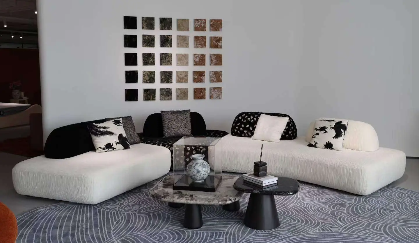 Furniture sourcing trip in China – curated living room furniture display in factory showroom