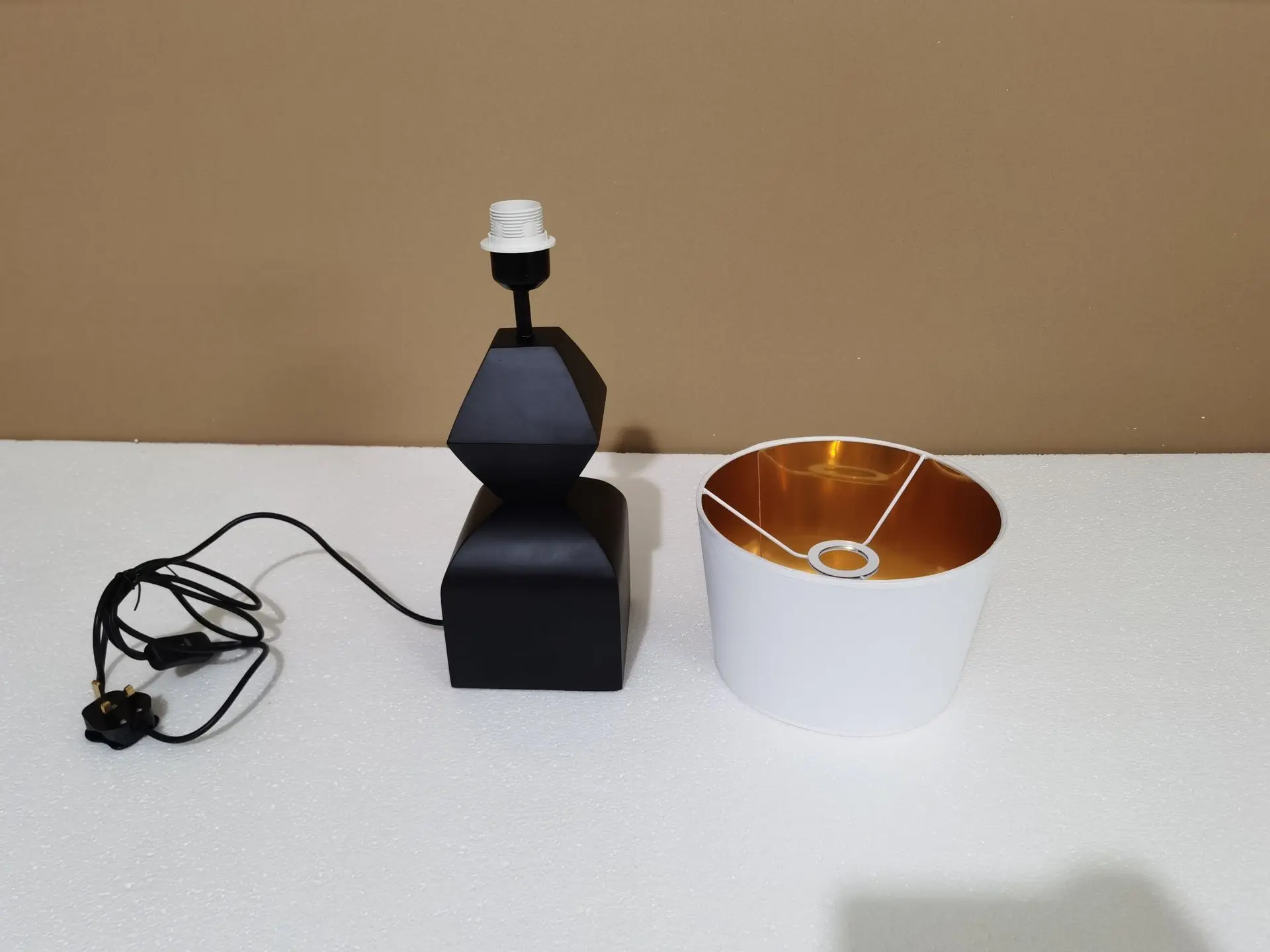 Product components prepared for durability and reliability testing during quality assurance phase of product development in China