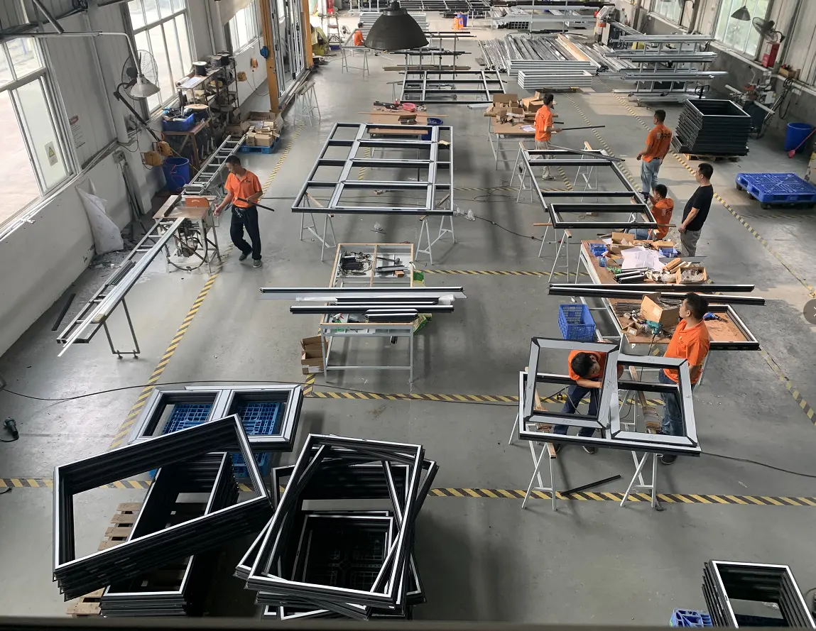 Millwork manufacturing process in Chinese factory showing CNC cutting, assembly lines, and metal frame production