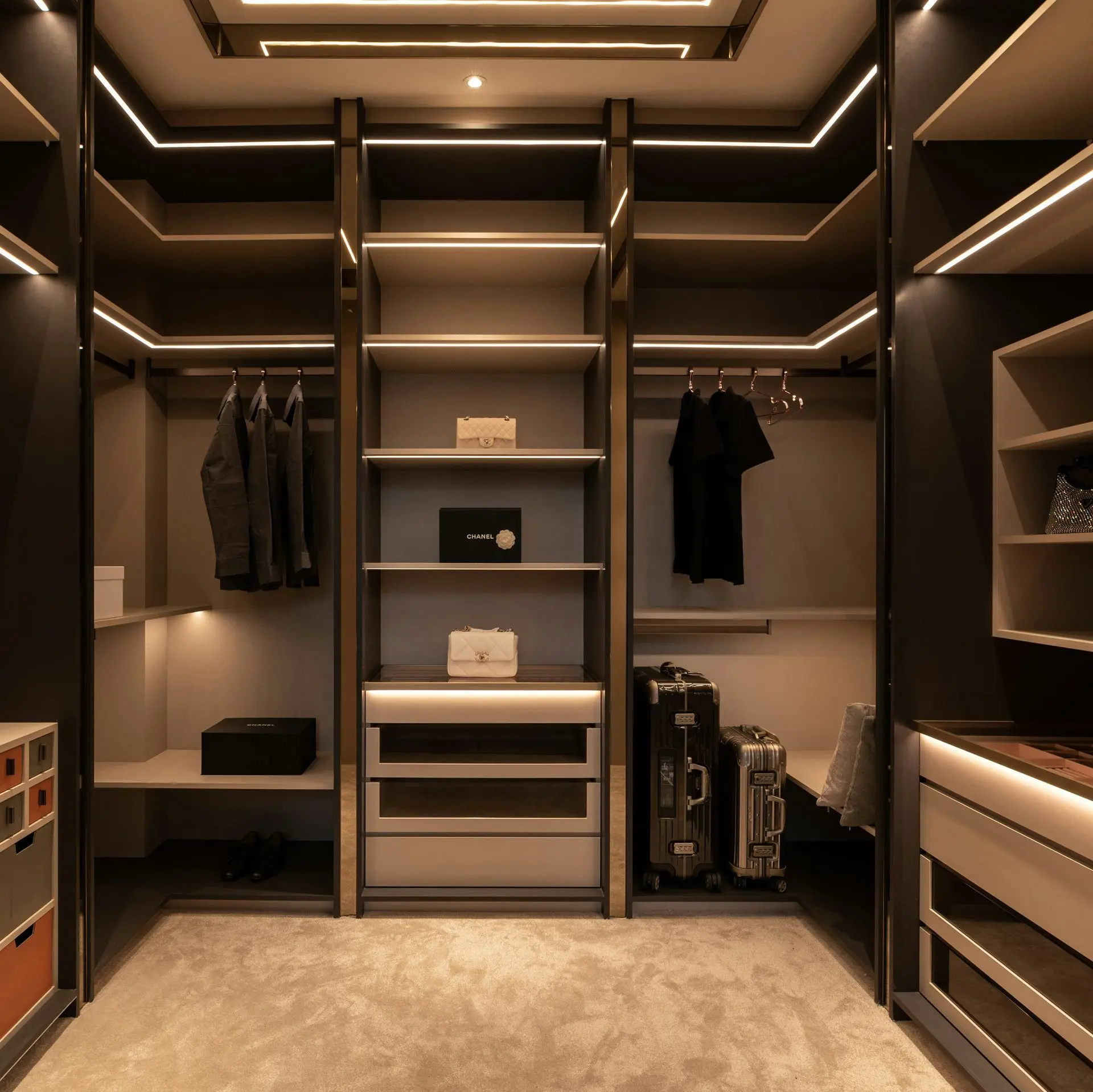 Luxury walk-in wardrobe millwork from China featuring MDF cabinetry, veneer finishes, and integrated LED lighting
