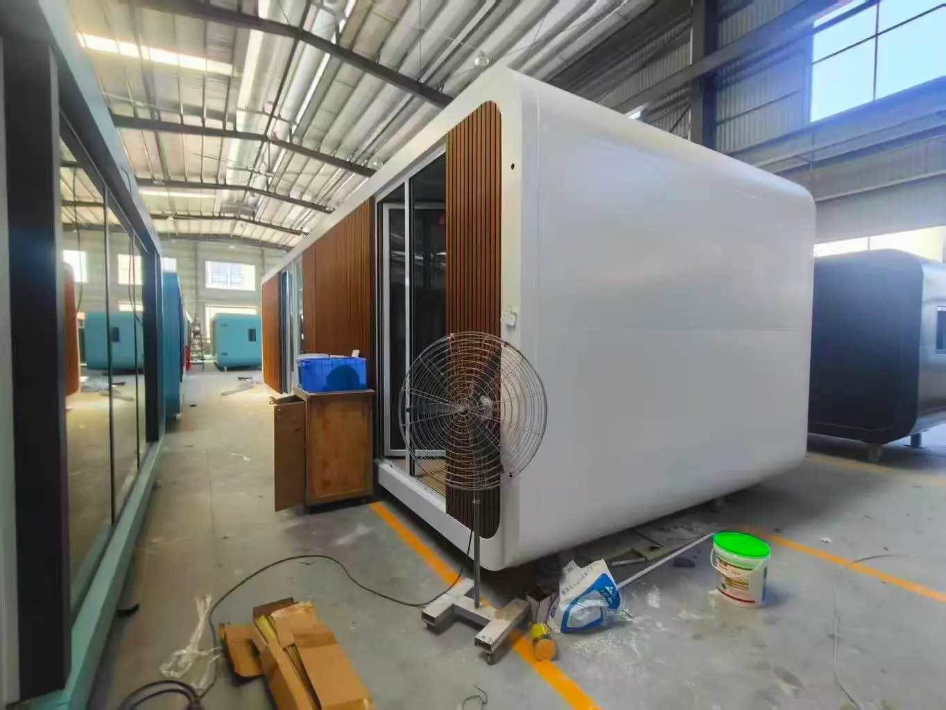 China Prefab House Modular Cabin Manufacturing in Factory China prefab house modular cabin under factory production with steel frame and modern exterior panels