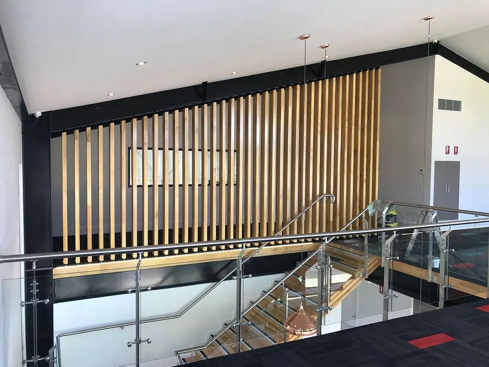 Interior staircase with glass and stainless steel system highlighting modern railings in China for commercial buildings