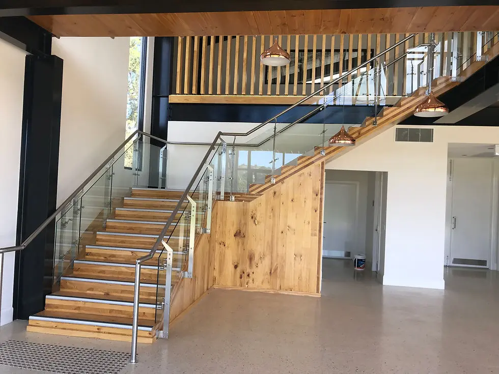 Modern staircase with glass and stainless steel system highlighting interior railings in China for residential and commercial spaces