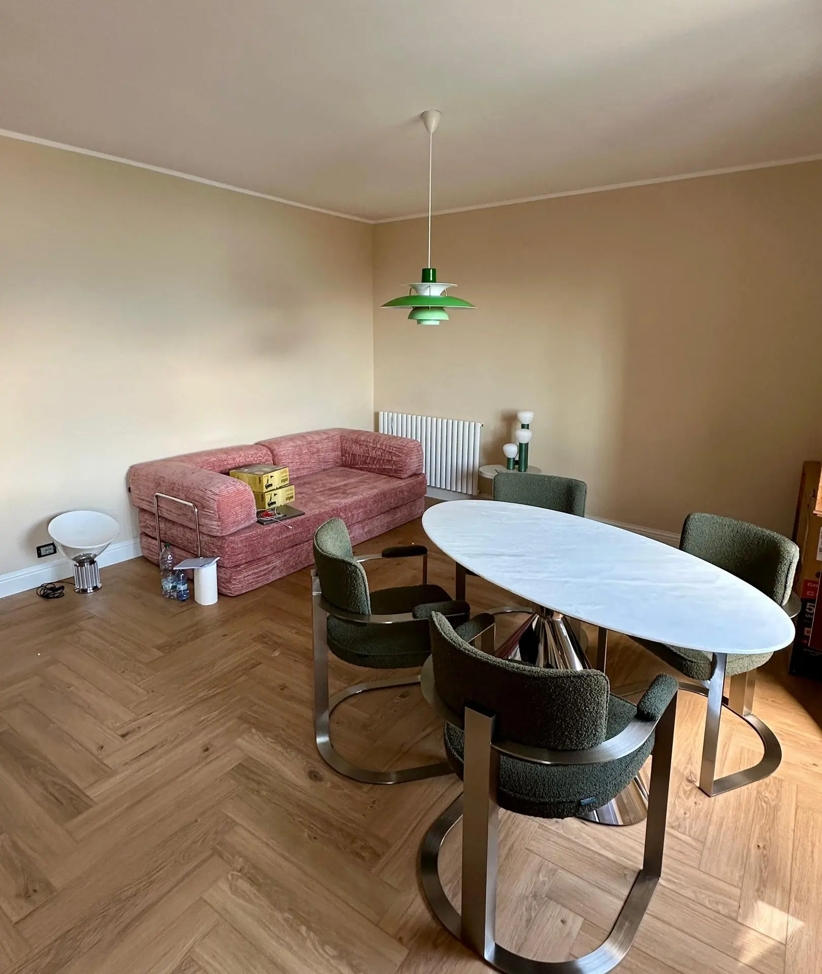 Lake Como hotel room with sofa and dining table