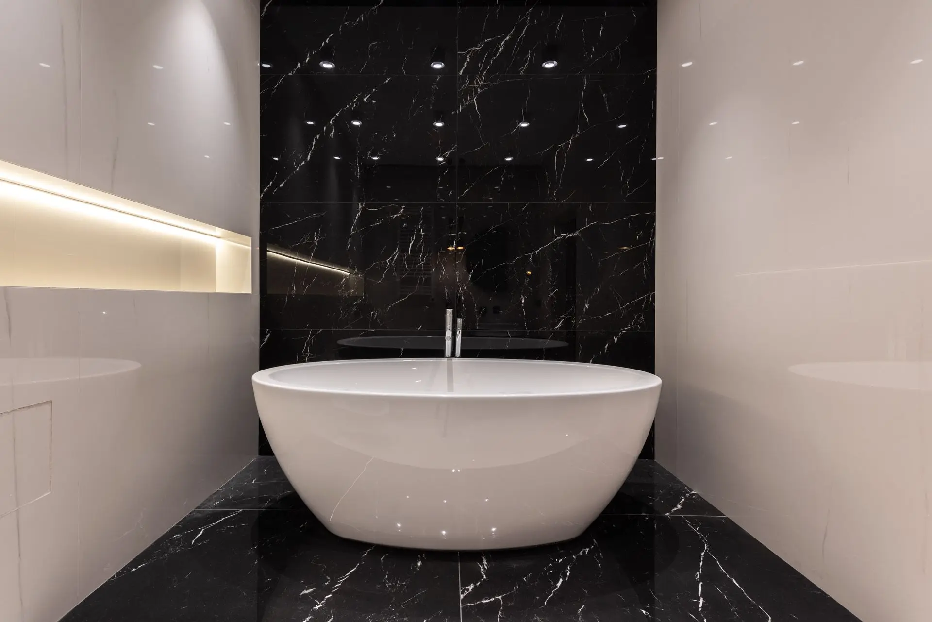 Bathtub Material Maintenance Tips for Modern Luxury Bathrooms Luxury solid surface bathtub in modern bathroom showcasing bathtub material maintenance