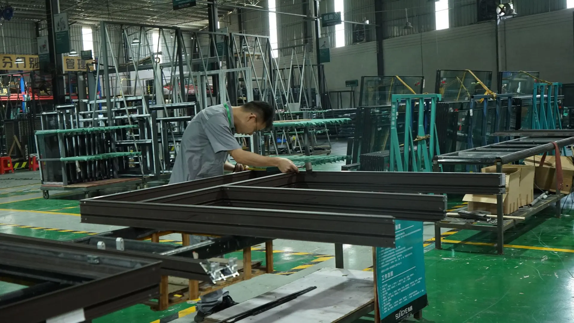 Low-E Windows China Manufacturing and Quality Control Process Low-E windows China factory producing energy-efficient aluminum window systems for commercial and residential projects