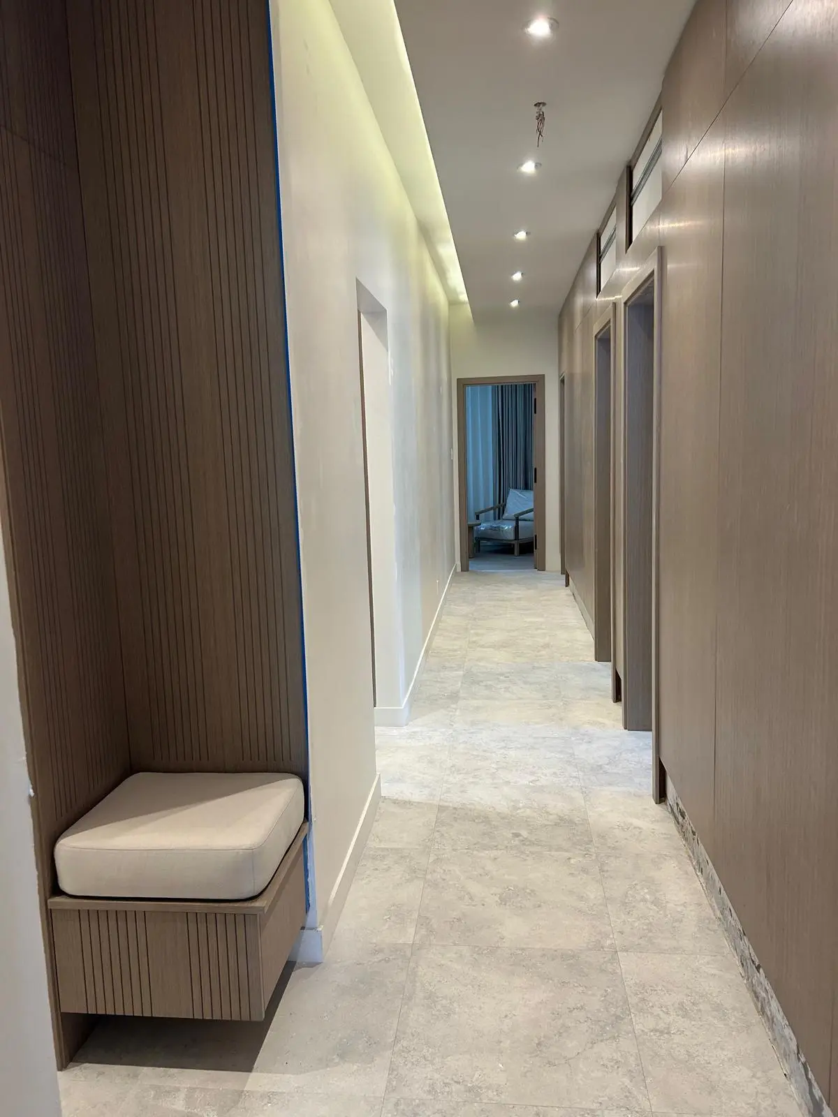 160 Atlantic hallway showcasing wall finishes, custom joinery, integrated seating, and architectural details