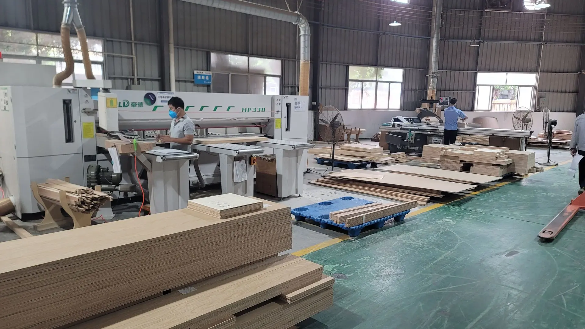 Modern woodworking factory producing custom furniture and building materials with advanced manufacturing equipment