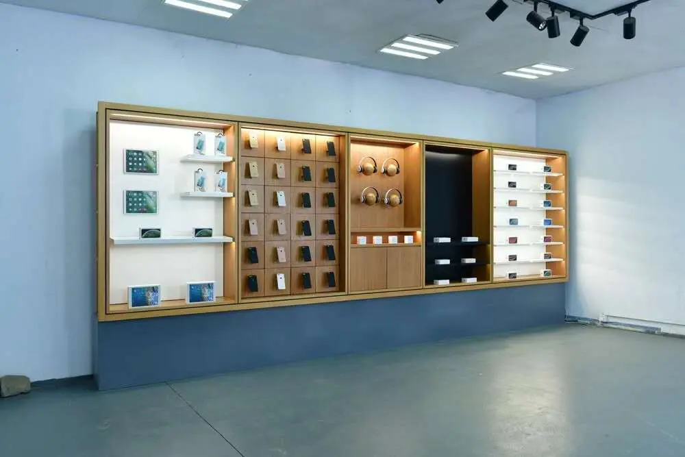 Modern modular retail display wall from China featuring illuminated shelving for consumer electronics