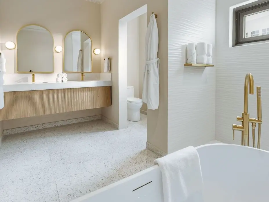 Modern villa bathroom with double vanity, bathtub and premium bathroom fixtures