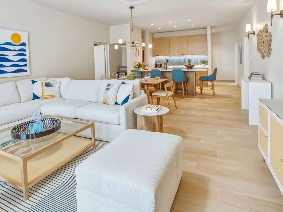 Luxury villa living and dining space with custom FF&E and modern furnishings