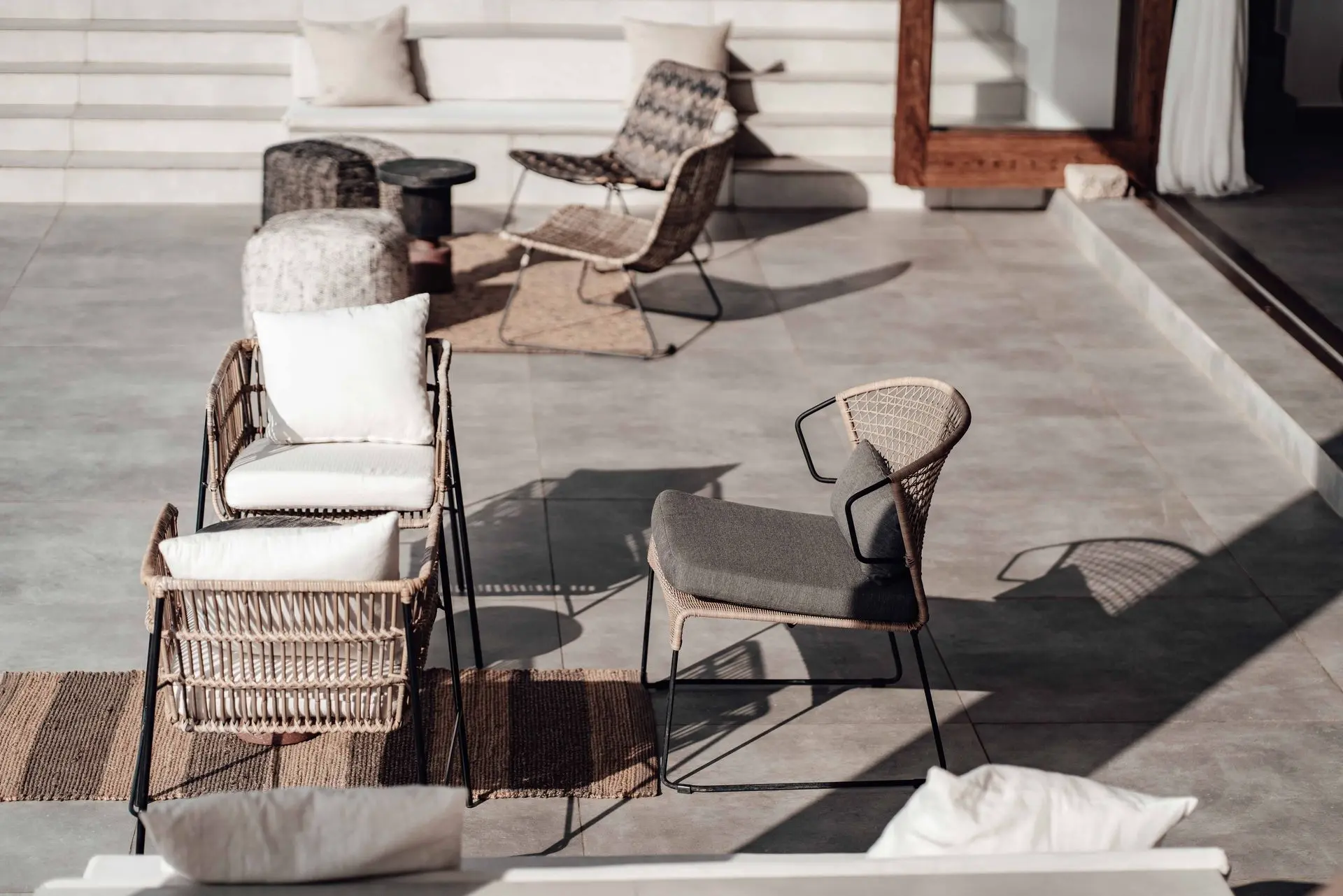 Modern Outdoor Armchairs and Lounge Chairs from China Modern outdoor armchairs and lounge chairs with woven rope details on a patio