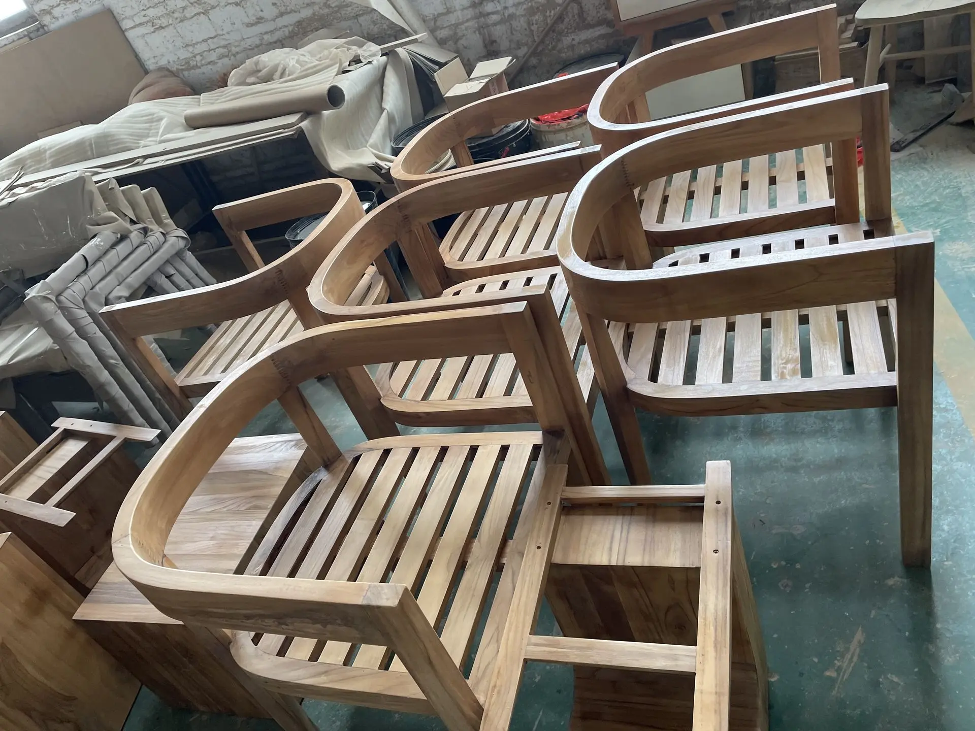 China Patio Furniture Production and Quality Control Unfinished wooden patio chairs during furniture production in a China factory