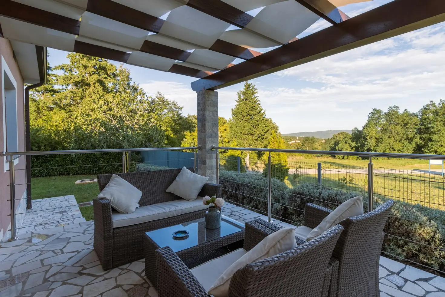 China patio furniture arranged in a coordinated outdoor seating area for a residential or hospitality project