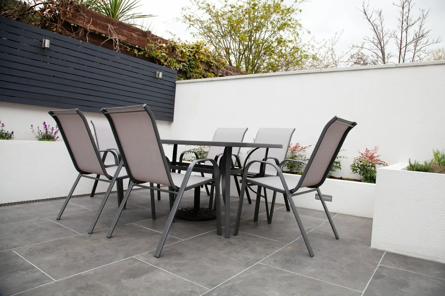 Aluminum patio dining table and lightweight outdoor chairs